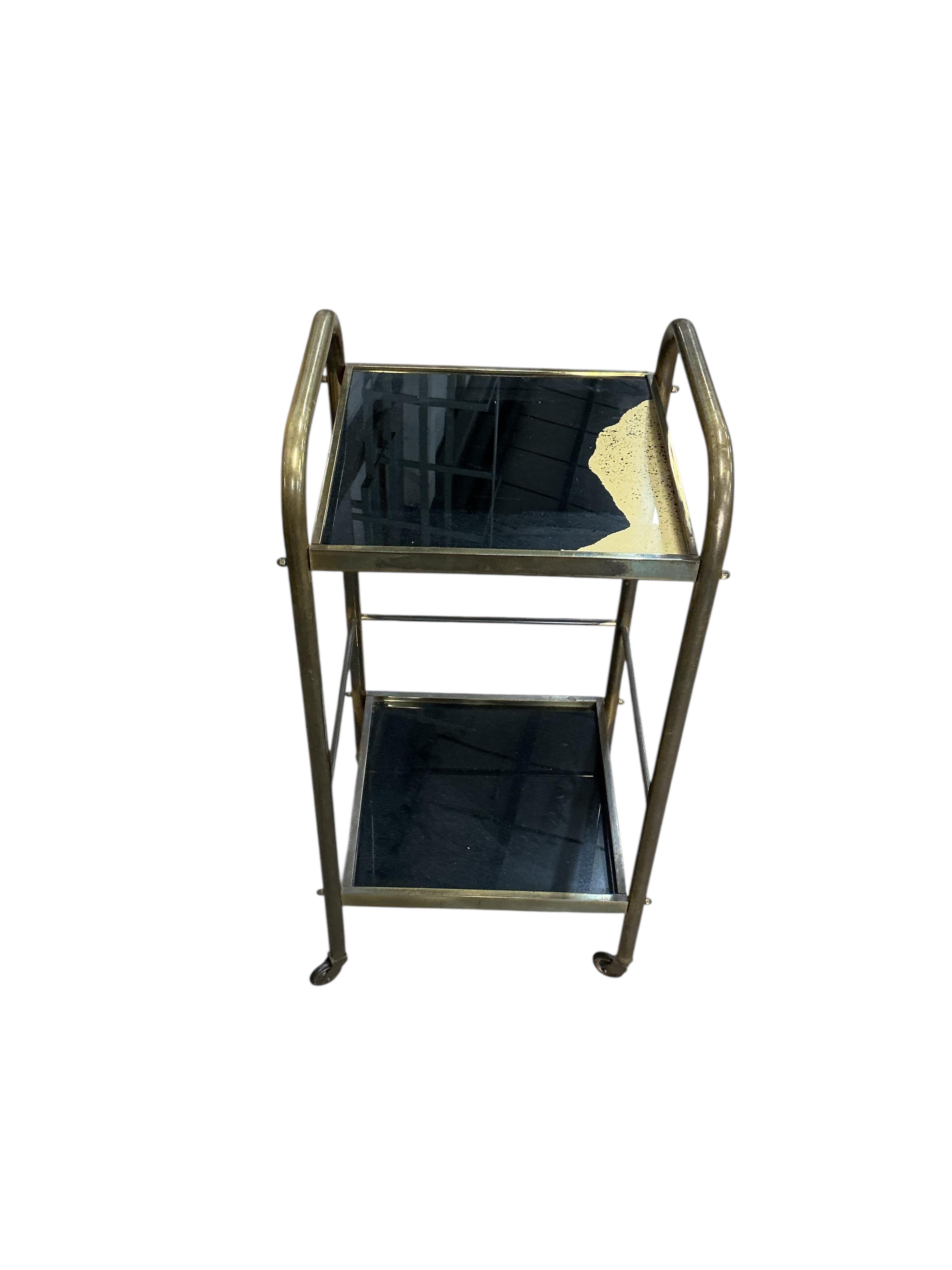 A mid century brass two tier trolley, width 32cm, depth 29cm, height 63cm